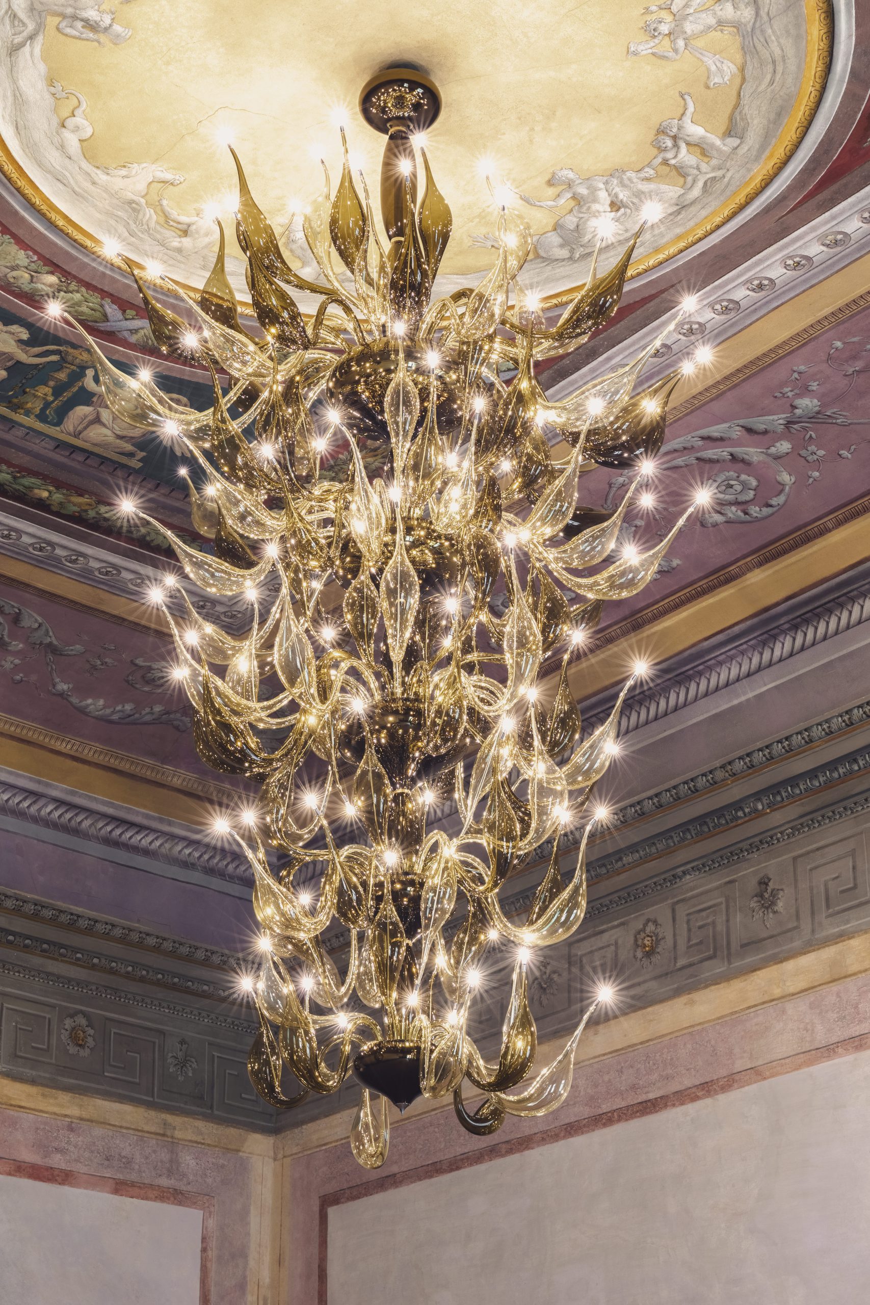 Big chandelier golden glass
