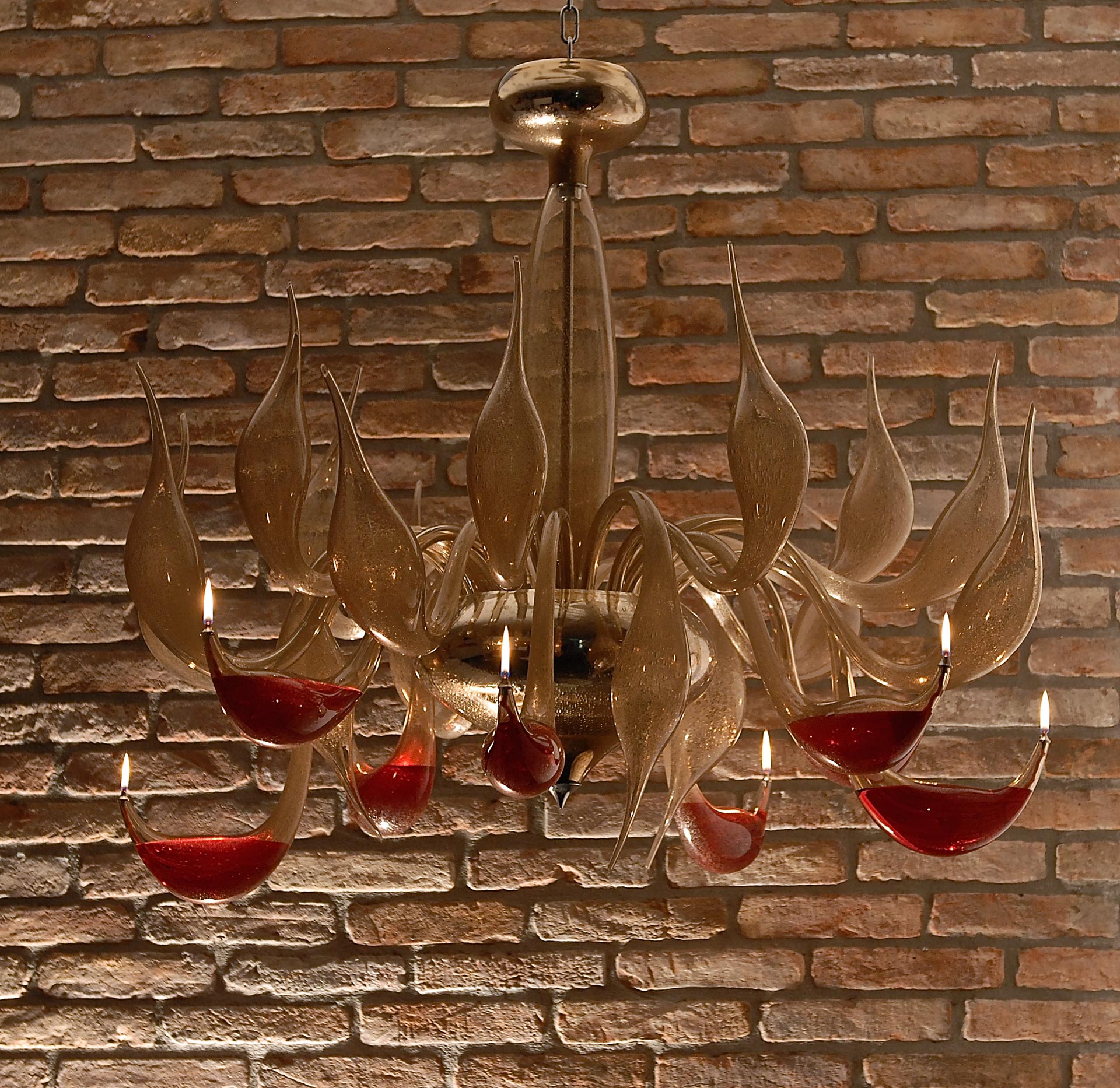 Transparent chandelier with red oil