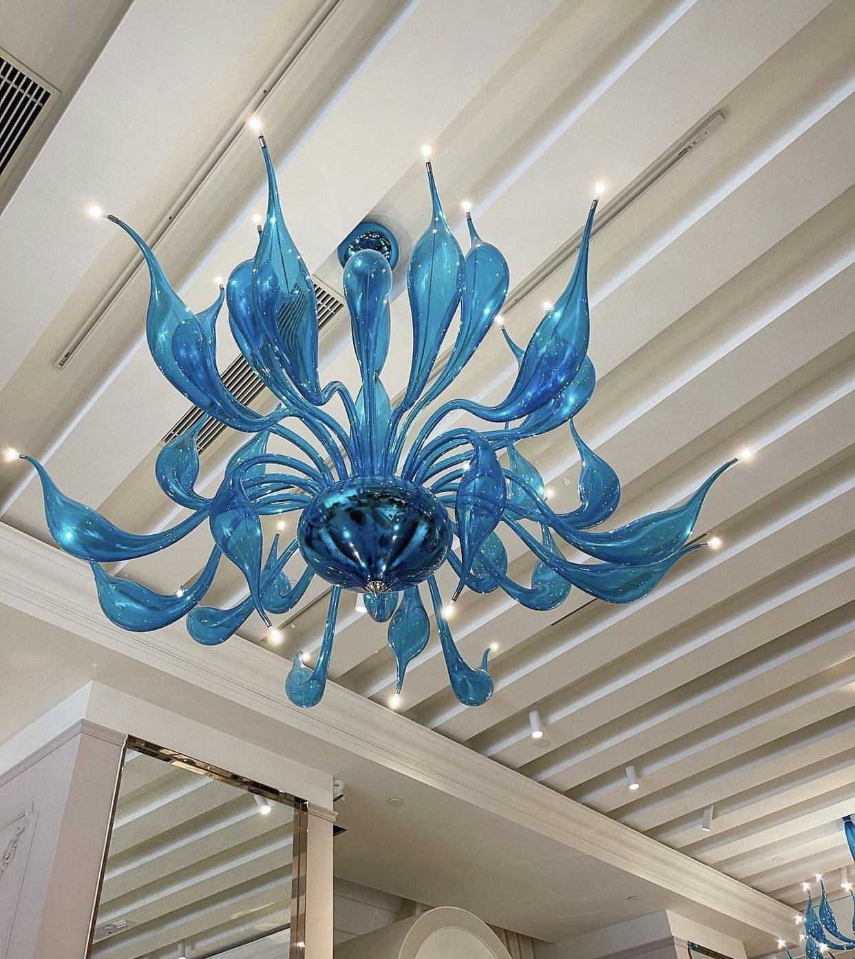 Turquoise chandelier from below